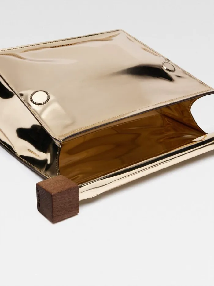 Women Crossbody and Handbags JACQUEMUS The Rond Carr Clutch Gold